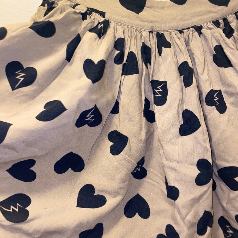 Broken heart pleated skirt